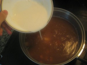 pouring sour cream mixture