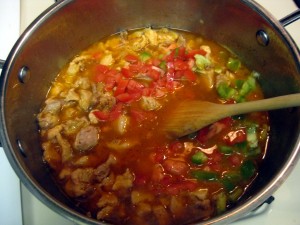 paprikash cooking with tomato and pepper