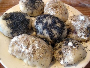 Slovak sweet steamed dumplings filled with plum jam and topped with poppy seeds or walnuts, buchty na pare
