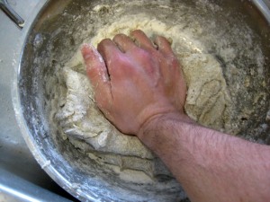 kneading rye bread dough, push out