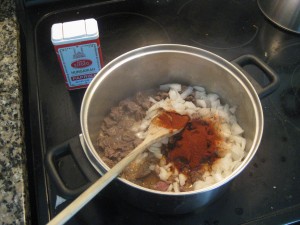 making goulash: add paprika