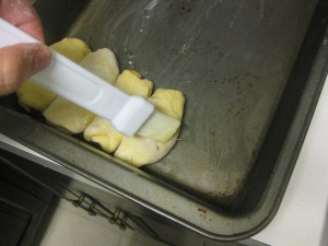 buchty placed on baking pan