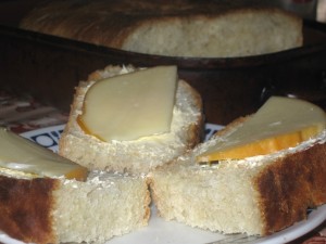 homemade bread baked in a wood burning oven with cheese and butter