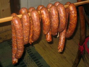 sausages hanging from a stick