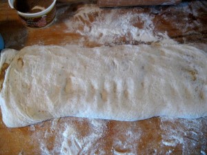 rolling out bacon biscuit dough