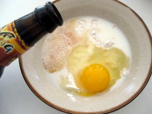 dough in which the burger is first dipped consisting of flour water eggs and possibly beer