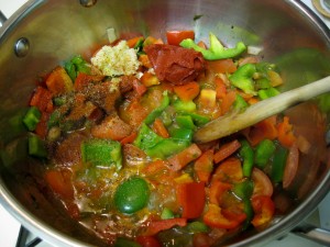 add garlic, salt, pepper, caraway and tomato sauce