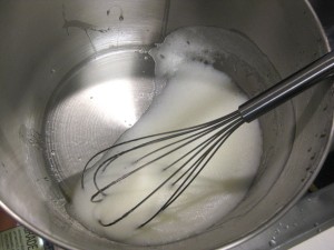 whipping egg whites with a hand whisk