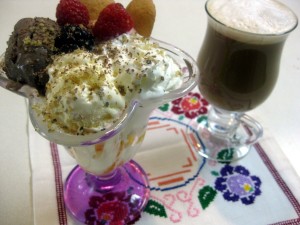 Slovak fruit ice cream sundae with berries walnuts chocolate and latte- ovocny zmrzlinovy pohar