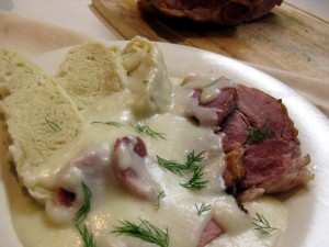 baked smoked pork meat in horseradish sauce