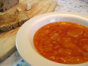 red cabbage soup with tomato paste and garlic toast