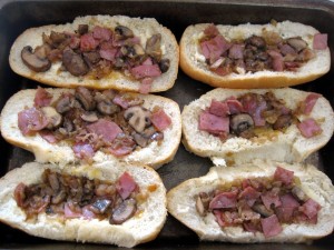 bread rolls covered in mushroom onion mix