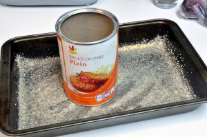 baking pan dusted with breadcrumbs