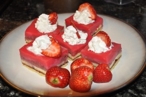 decorated strawberry pudding cake with whipped cream