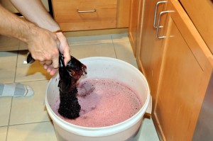 adding crushed grape skins