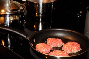 frying meat patties